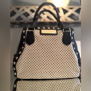 Betsy Johnson purse- cute for casual or dressy occasions 
Excellent condition